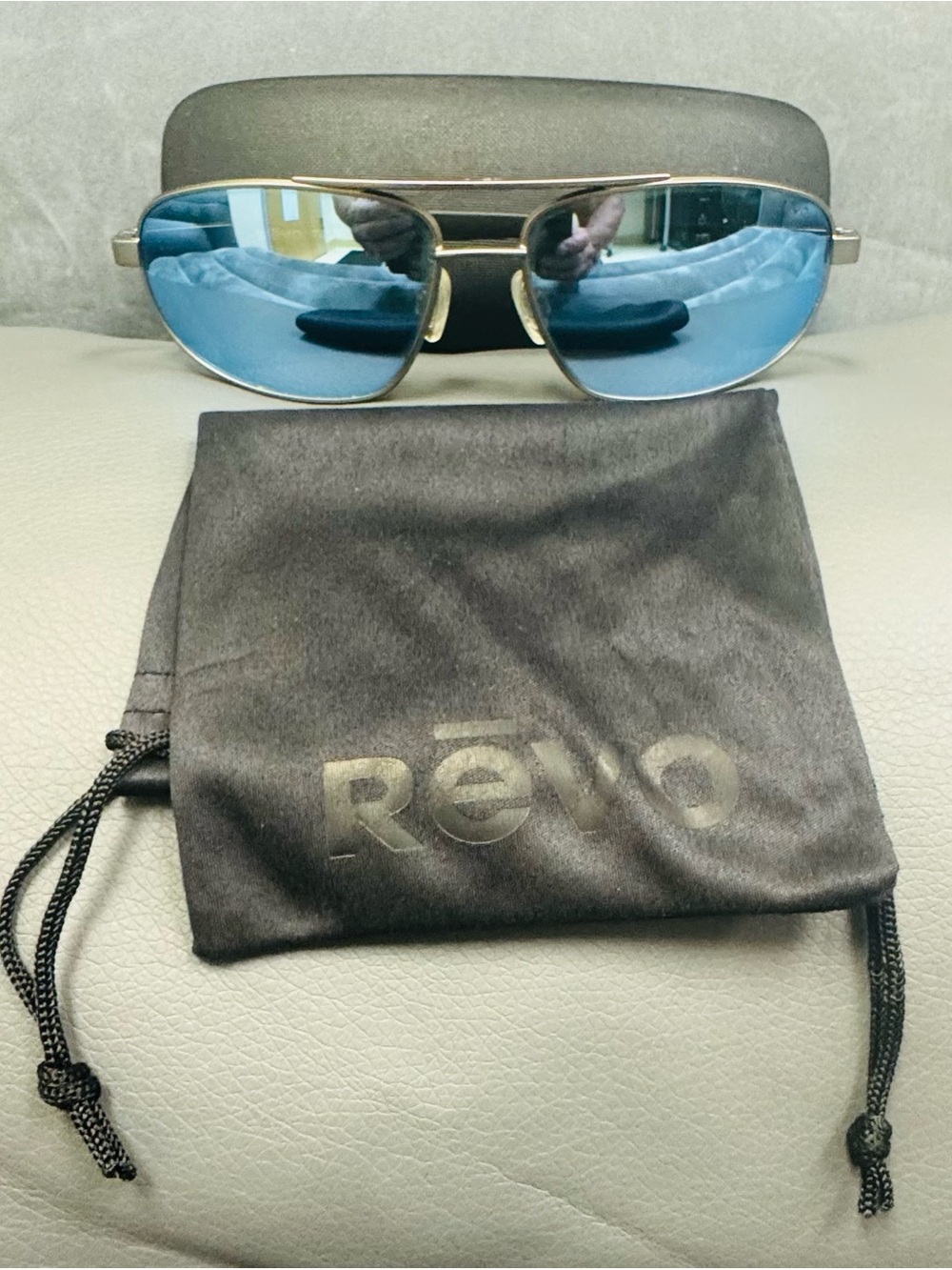 Revo NASH Silver Frame Sunglasses with Blue Mirrored Lenses